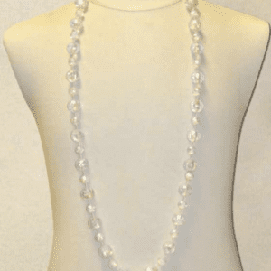 A necklace made with silver globe beads