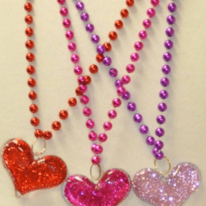 Three colorful bead necklaces with heart pendants